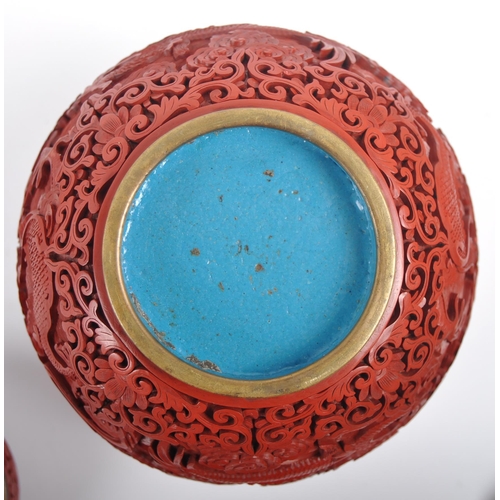 160 - A large Chinese 19th Century Cinnabar red lacquer ginger jar & cover raised on good quality pierced ... 