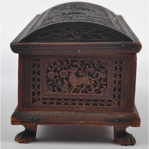 162 - A 19th Century Anglo-Indian colonial carved box having a domed top with intricately carved panel sid... 