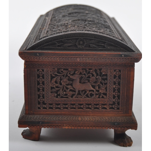 162 - A 19th Century Anglo-Indian colonial carved box having a domed top with intricately carved panel sid... 