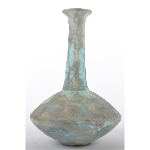 164 - A Chinese Oriental Han Dynasty manner pottery vase. Flared circular rim with long tapered cylindrica... 