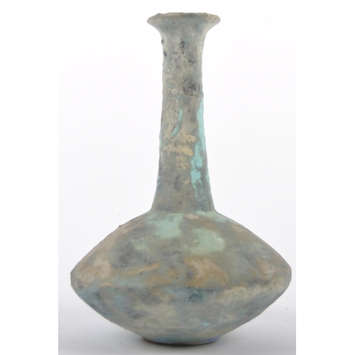 164 - A Chinese Oriental Han Dynasty manner pottery vase. Flared circular rim with long tapered cylindrica... 