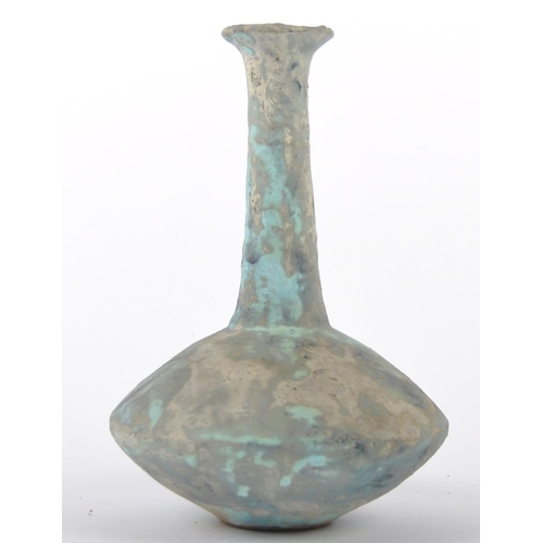 164 - A Chinese Oriental Han Dynasty manner pottery vase. Flared circular rim with long tapered cylindrica... 