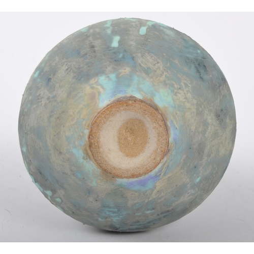 164 - A Chinese Oriental Han Dynasty manner pottery vase. Flared circular rim with long tapered cylindrica... 