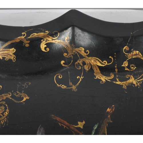 168 - An 18th Century Chinese black lacquer export papier mache tray of scalloped form. Central painted fl... 