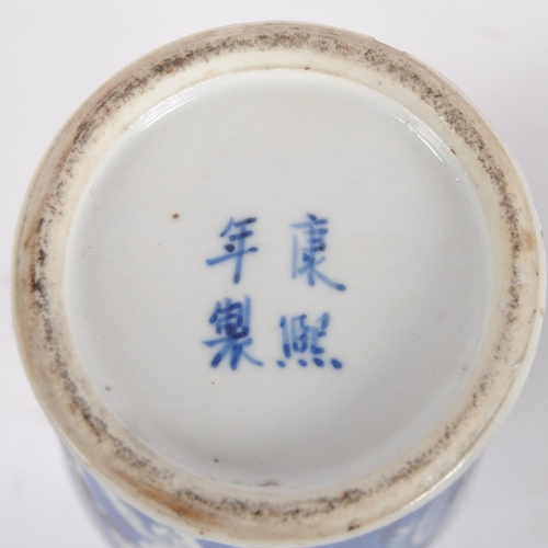 169 - A pair of 19th Century Chinese Kangxi mark blue & white porcelain vases and covers. Foo dog finial t... 