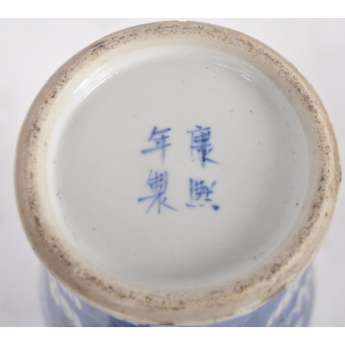 169 - A pair of 19th Century Chinese Kangxi mark blue & white porcelain vases and covers. Foo dog finial t... 