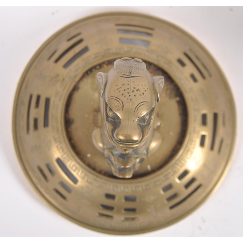 171 - A Chinese twin handled bronze incense burner.   With asynchronous floral décor to surround, depictin... 