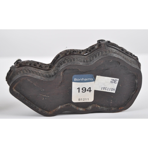 172 - An early 20th Century Chinese large carved jade figurine depicting a cockerel / rooster standing on ... 