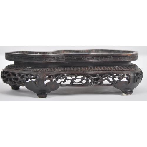 172 - An early 20th Century Chinese large carved jade figurine depicting a cockerel / rooster standing on ... 