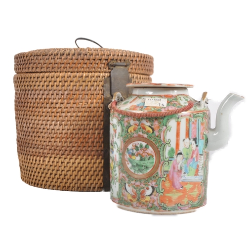 174 - A 19th Century Chinese Cantonese export porcelain famille rose medallion teapot held within the orig... 