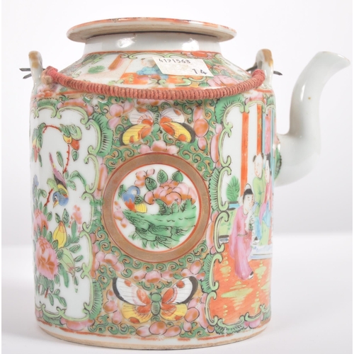 174 - A 19th Century Chinese Cantonese export porcelain famille rose medallion teapot held within the orig... 