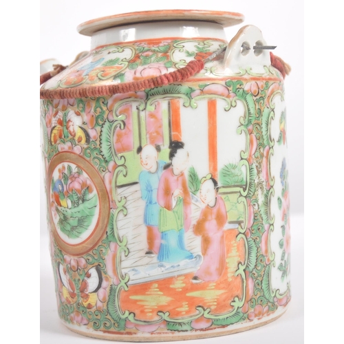 174 - A 19th Century Chinese Cantonese export porcelain famille rose medallion teapot held within the orig... 