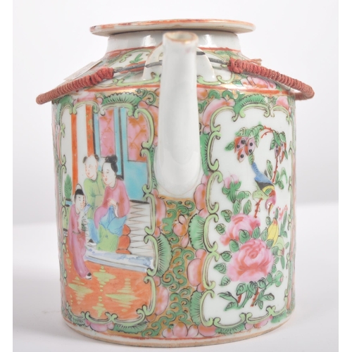 174 - A 19th Century Chinese Cantonese export porcelain famille rose medallion teapot held within the orig... 