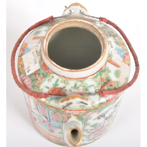 174 - A 19th Century Chinese Cantonese export porcelain famille rose medallion teapot held within the orig... 