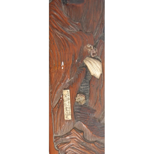 176 - A pair of 19th century Japanese carved bamboo decorated wall panels. Carving of floral decorations w... 