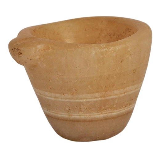 177 - An ancient Egyptian banded agate vessel. Of frustoconical form with a lipped section for pouring. Ap... 