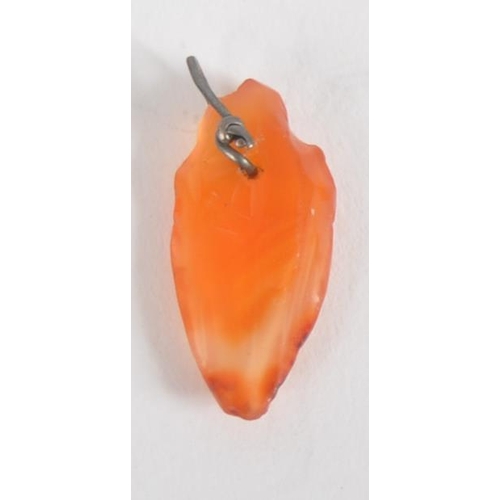 179 - An ancient Egyptian heart pendant. Made from carnelian, in the form of a heart, hand carved with wir... 