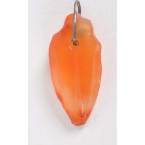 179 - An ancient Egyptian heart pendant. Made from carnelian, in the form of a heart, hand carved with wir... 