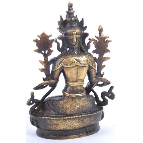 18 - A 20th Century Chinese bronze figurine of Buddha / Green Tara. The figure modelled in the Lotus posi... 