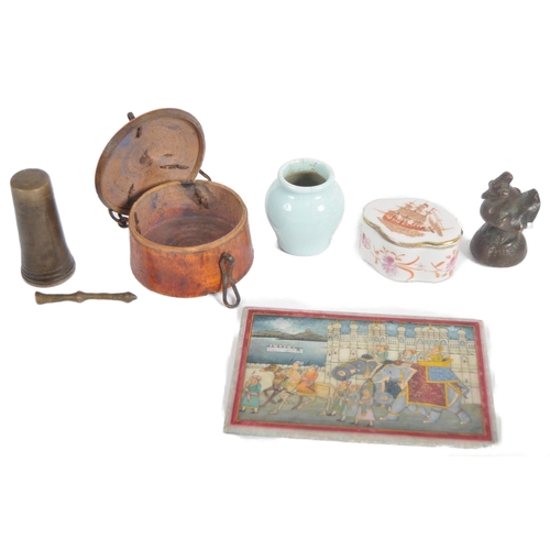 180 - A mixed collection of 18th, 19th and 20th century Indian and Chinese curiosities. To include a Tibet... 