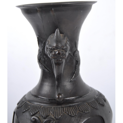 2 - A 19th Century Japanese Meiji bronze vase. Cast relief decoration depicting birds in botanical scene... 