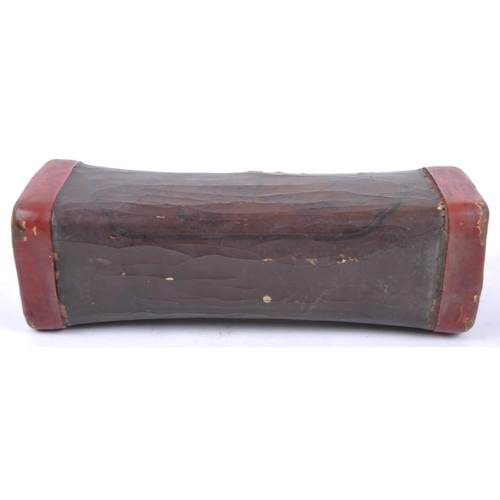 22 - A 19th Century Chinese papier mache & lacquer head rest pillow. Shaped form with red lacquer edges, ... 