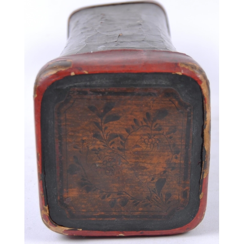 22 - A 19th Century Chinese papier mache & lacquer head rest pillow. Shaped form with red lacquer edges, ... 