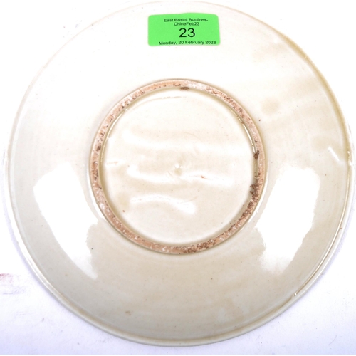 23 - A Chinese Song Dynasty (believed) porcelain plate of circular form having a central depiction of a D... 