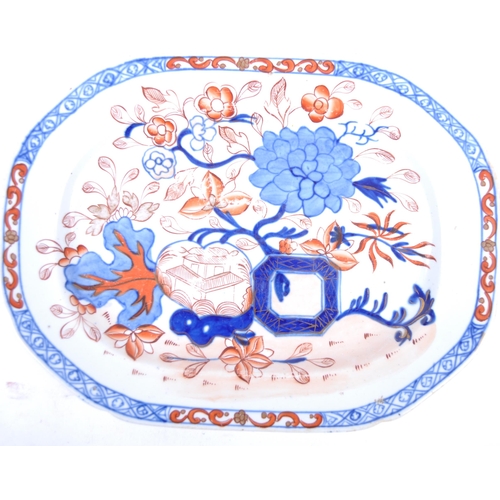 24 - An 18th Century Chinese porcelain tray plate platter of octagonal form. Hand painted with scenes of ... 