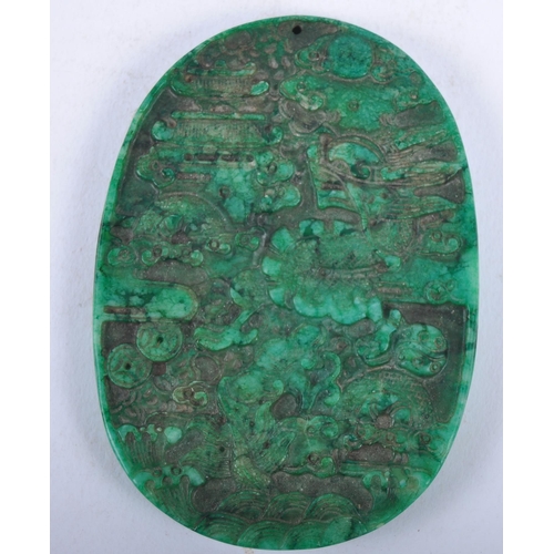 34 - An early 20th Century Chinese green carved malachite panel of oval form depicting dragon in clouds w... 