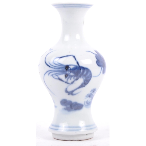 35 - An early 20th Century Chinese Oriental porcelain vase of baluster shape having hand painted blue & w... 
