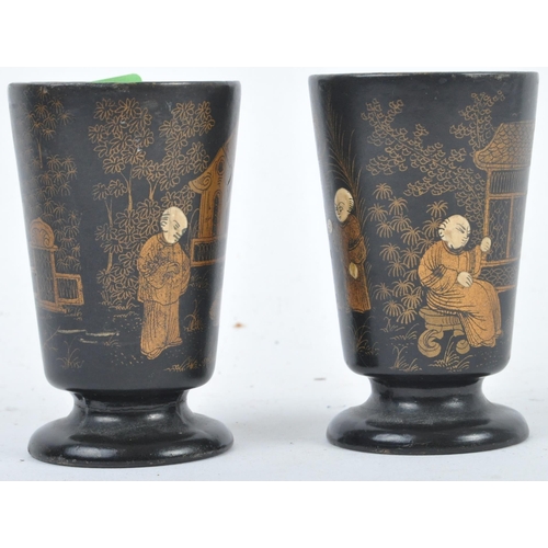 42 - A pair of early 20th Century Chinese / Japanese black lacquer gilded drinking cups. Hand painted dec... 