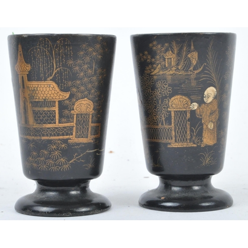 42 - A pair of early 20th Century Chinese / Japanese black lacquer gilded drinking cups. Hand painted dec... 