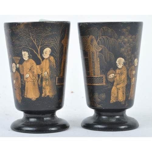 42 - A pair of early 20th Century Chinese / Japanese black lacquer gilded drinking cups. Hand painted dec... 