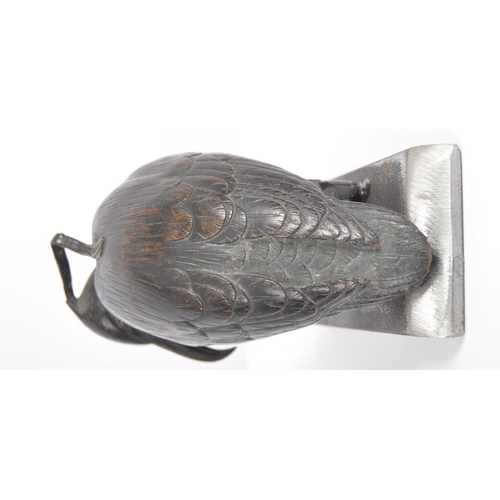 51 - A 19th Century Japanese Meiji bronze figurine depicting a bird. The figure raised on plinth base hav... 