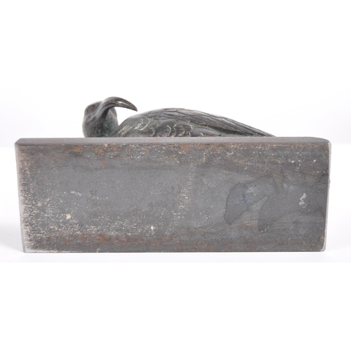 51 - A 19th Century Japanese Meiji bronze figurine depicting a bird. The figure raised on plinth base hav... 