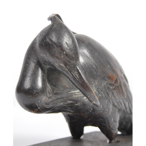51 - A 19th Century Japanese Meiji bronze figurine depicting a bird. The figure raised on plinth base hav... 