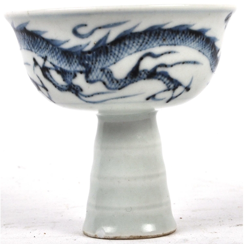52 - A 20th Century Chinese blue & white porcelain footed pedestal bowl. Hand painted decoration depictin... 