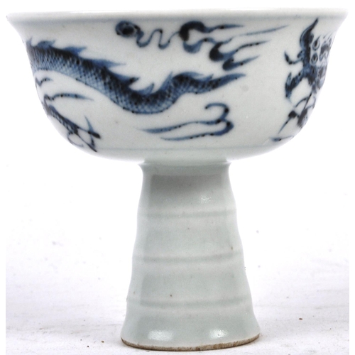 52 - A 20th Century Chinese blue & white porcelain footed pedestal bowl. Hand painted decoration depictin... 