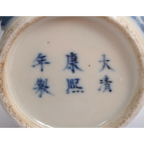 53 - A 19th Century Chinese Kangxi mark blue & white porcelain vase having a flared rim with slender neck... 