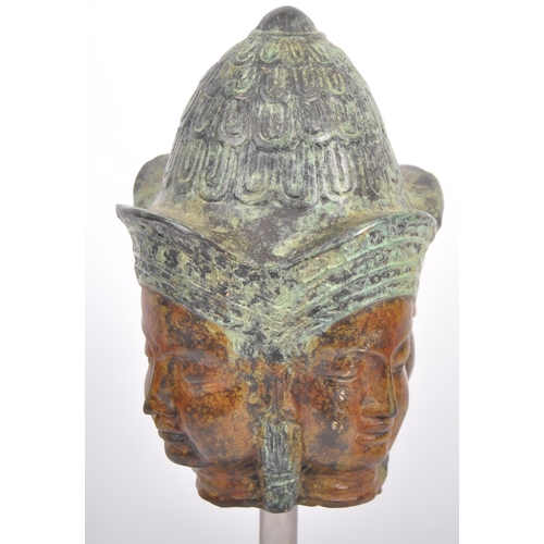 54 - A 20th Century Chinese Tibetan Thai bronze Buddha Phra Phrom four headed head. Cast features with tw... 