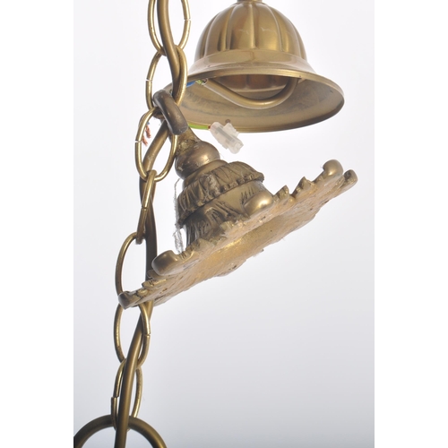 116 - A 20th Century Dutch manner brass ceiling light chandelier. Typical form with globular centre with f... 