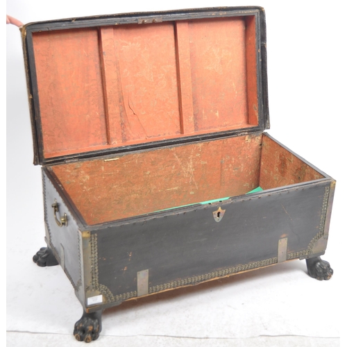 117 - An early 19th Century George III Regency period leather and brass bound campaign travel trunk having... 