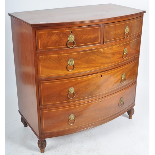 124 - An early 19th Century George III mahogany inlaid bow fronted chest of drawers. The bank of two over ... 