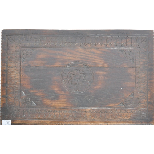 13 - A 17th Century carved oak bible box. Rectangular form with carved rose to lid. The sides and top car... 