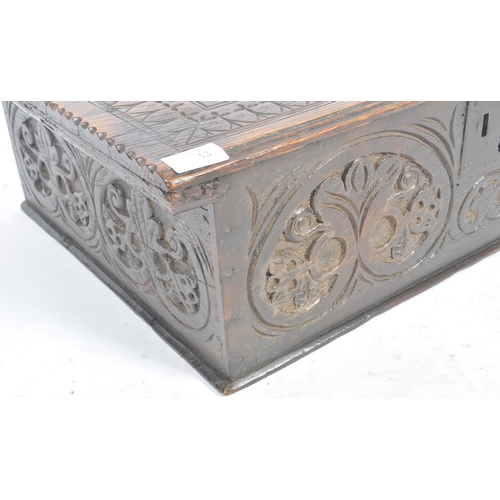 13 - A 17th Century carved oak bible box. Rectangular form with carved rose to lid. The sides and top car... 