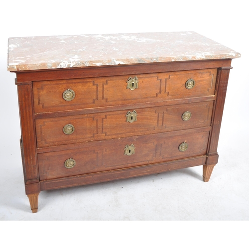 135 - A 19th Century French mahogany commode chest of drawers having a chamfered edge marble top over thre... 