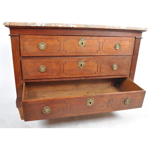 135 - A 19th Century French mahogany commode chest of drawers having a chamfered edge marble top over thre... 