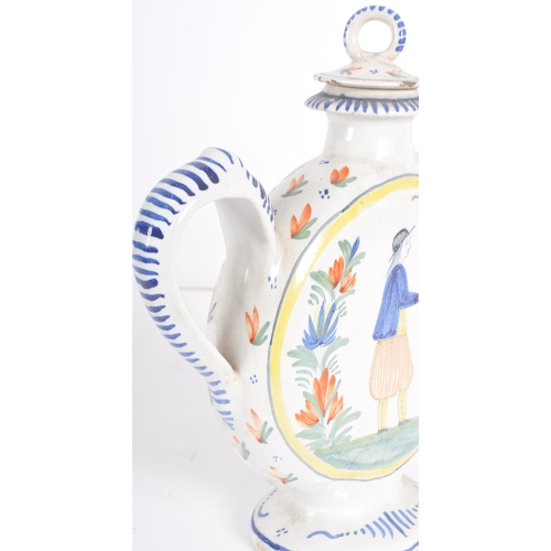 14 - A 19th Century French Faience teapot by Henriot Quimper. Moonflask shape with hand painted decoratio... 