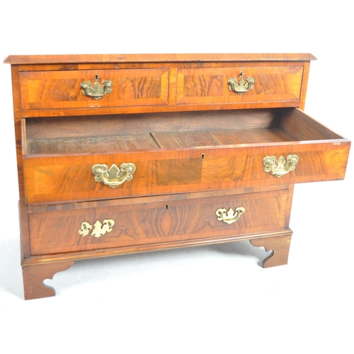 140 - A 19th Century Queen Anne revival walnut two over three chest of drawers. The bank of drawers having... 